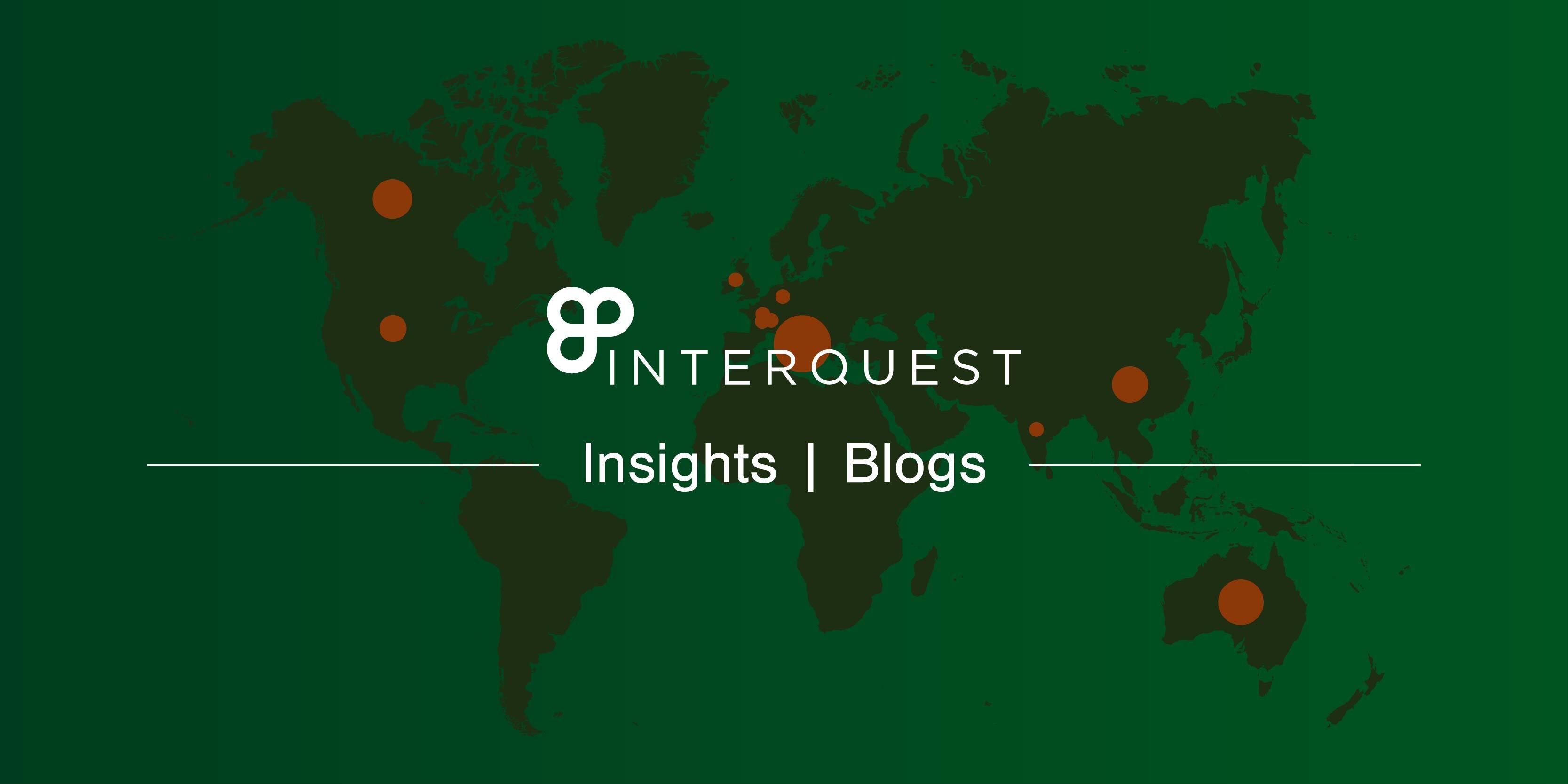White InterQuest logo on a grey-filtered background graphic of a green world map