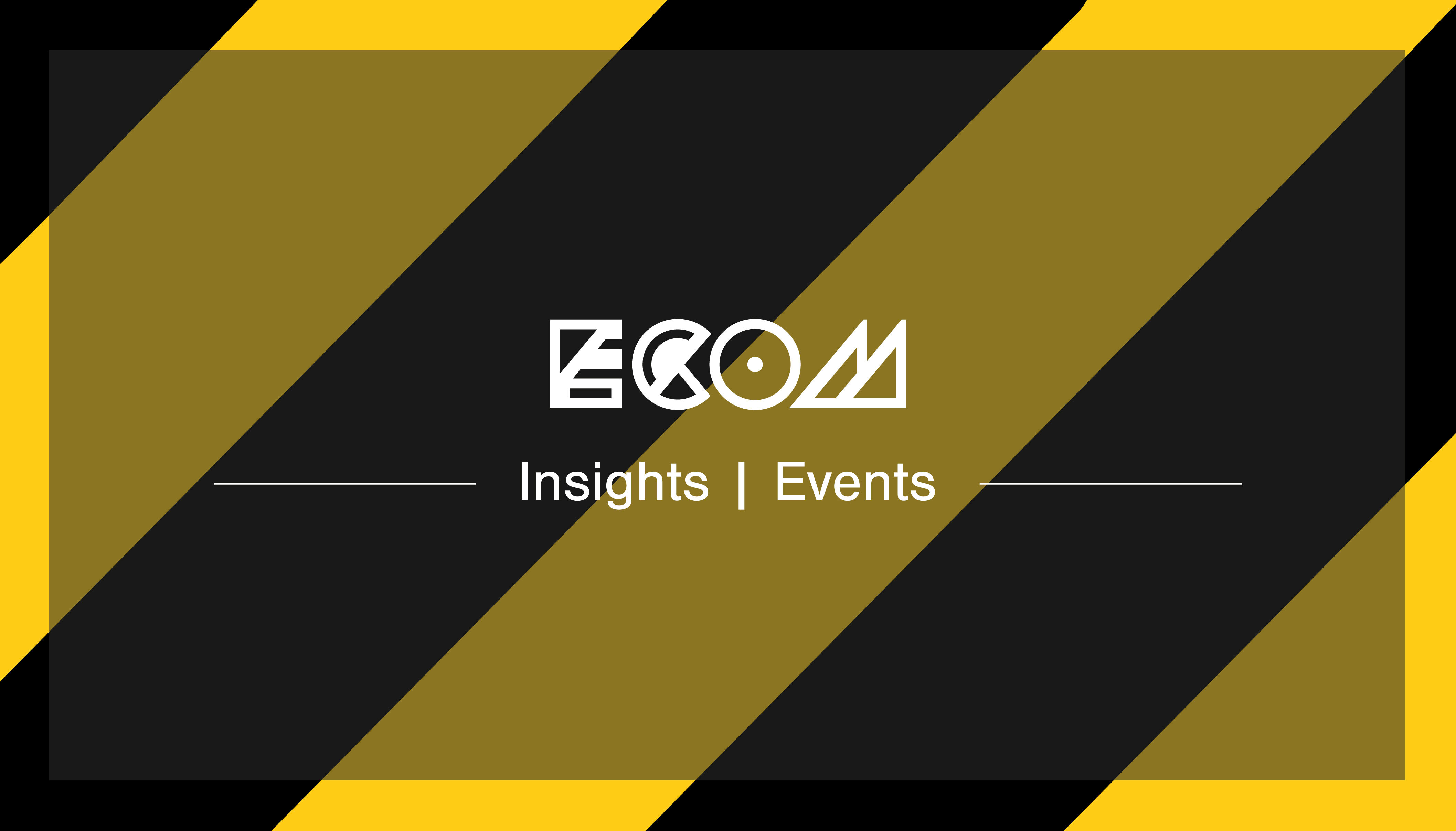 White ECOM logo insights banner on Hack Manchester black and yellow stripped background
