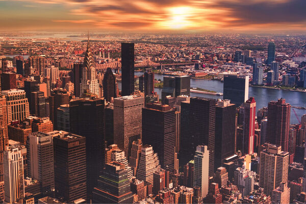 A photo of New York City skylines at sunset