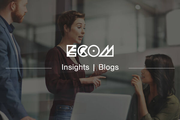 ECOM branded header banner for a blog with a background picture of three people talking
