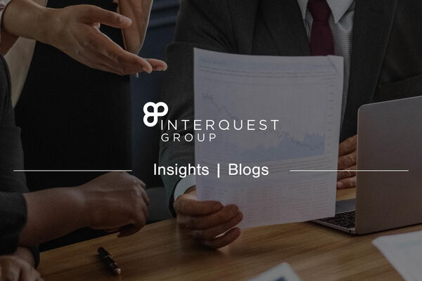 InterQuest Group insights blogs banner background image of people looking at results on a piece of paper