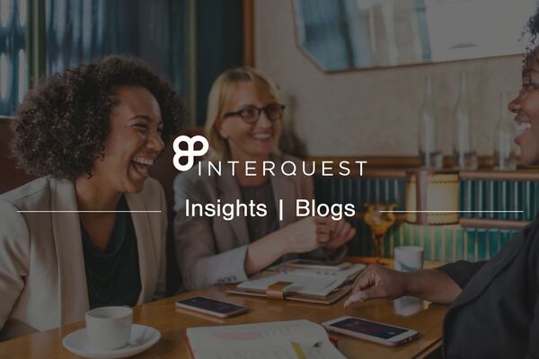 InterQuest insights blogs banner background image of three people talking at a table with cups of coffee