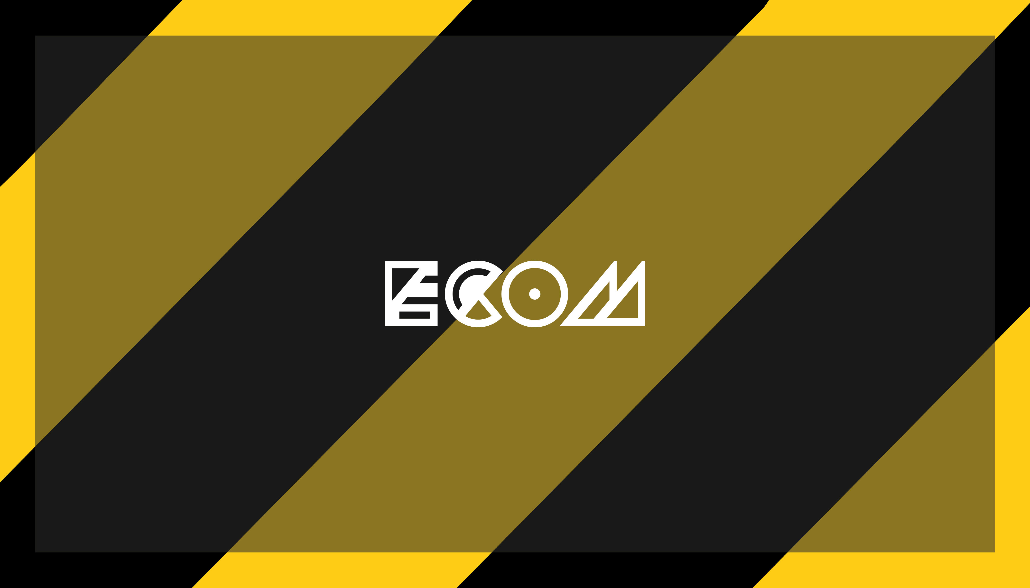 White ECOM logo on a Hack Manchester banner