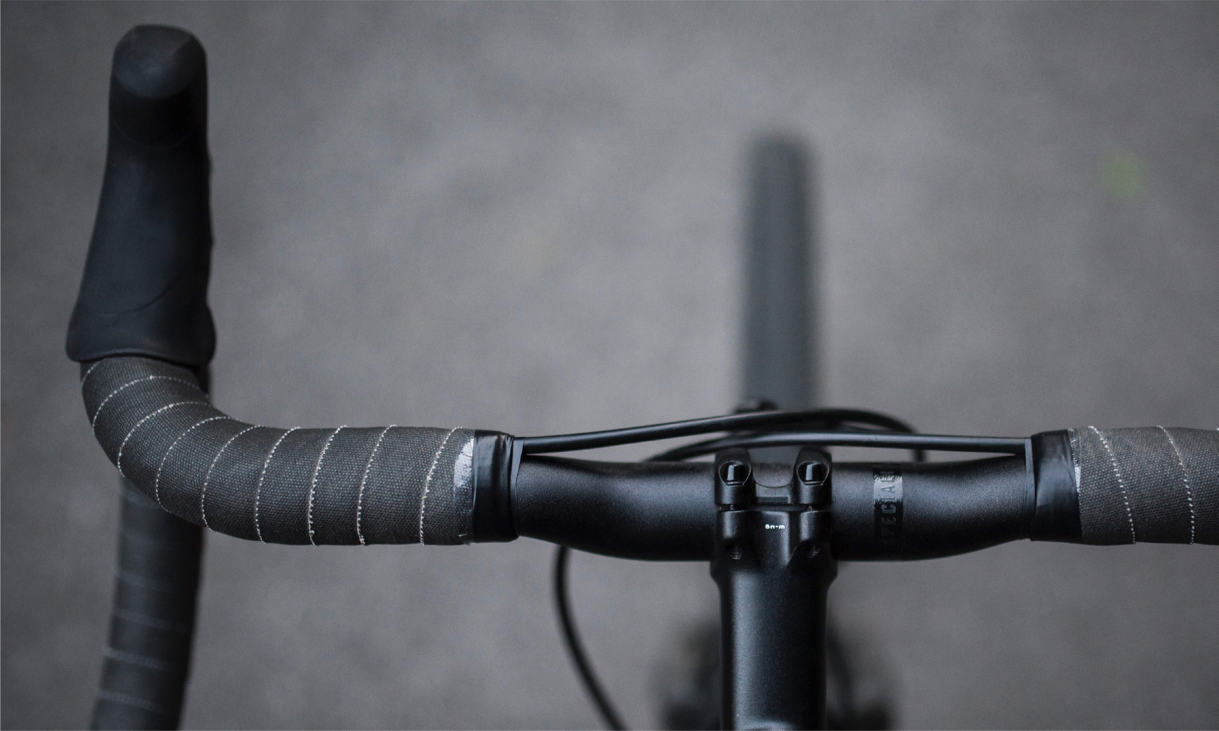 Photo of road bicycle handlebars from the view of the rider