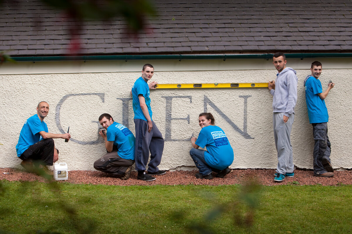 Tomorrow's People charity painting Glenkinchie on the wall of a building